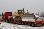 Перевозка спецтехники тралом-компания Техоптимум.
Тягач DAF 105 и низкорамный полуприцеп Faymonville компании Техоптимум.